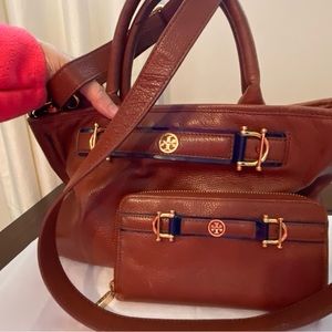 Tory Burch handbag with matching wallet.  Brown with blue trim.
